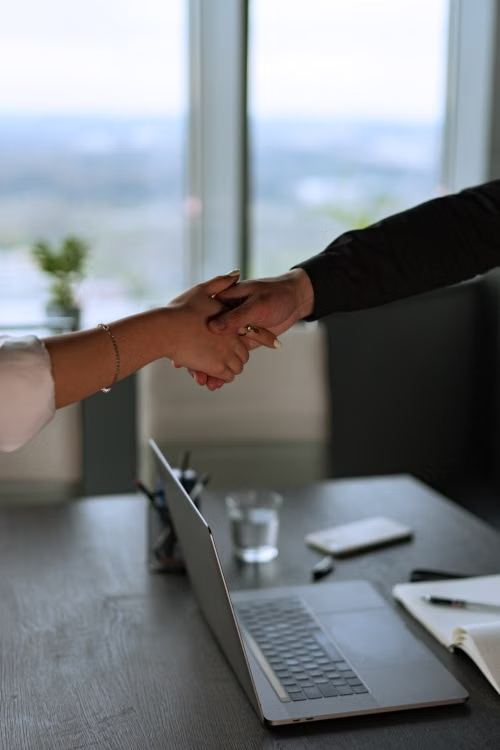 Handshake celebrating a completed business setup